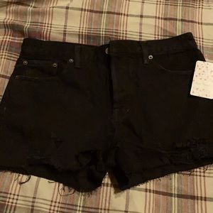 Black cutoff distressed jean shorts